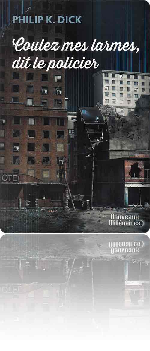 couverture dans les tons sombres représentant un quartier d'une ville en décomposition